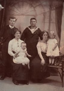 James Clancy and his wife Sophia (nee Waddle) and their daughter Ellie, Daniel Connolly and his wife Mary Ellen (nee Clancy) and their daughter Agnes. (circa early 1914). Photo taken Devonport, Devon.